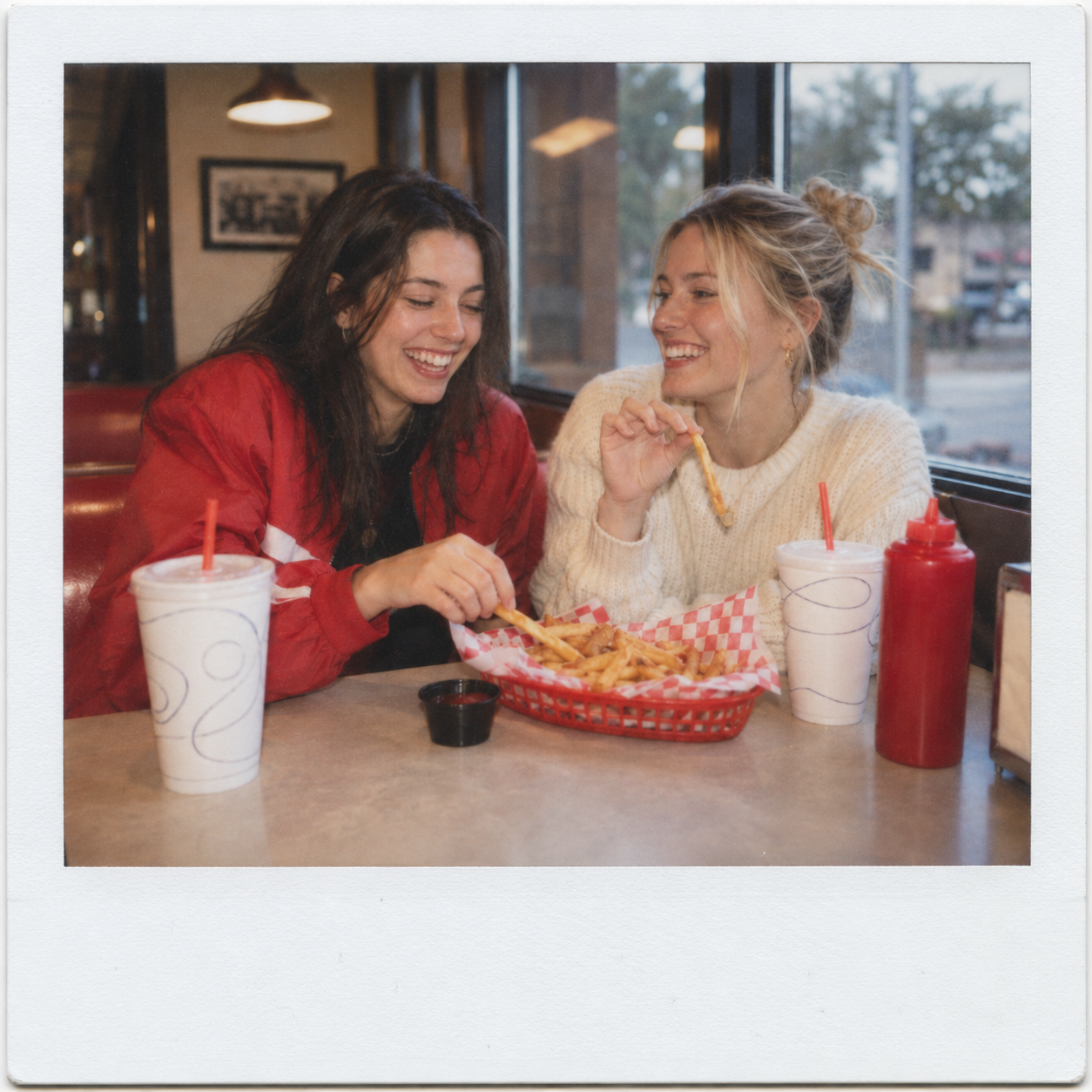 Two friends transformed into a Polaroid-style photo with AI